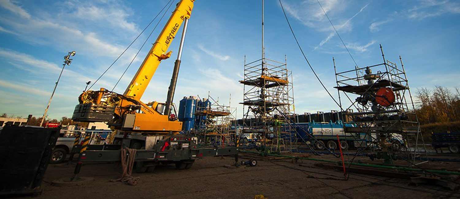 A construction site with cranes and scaffolding