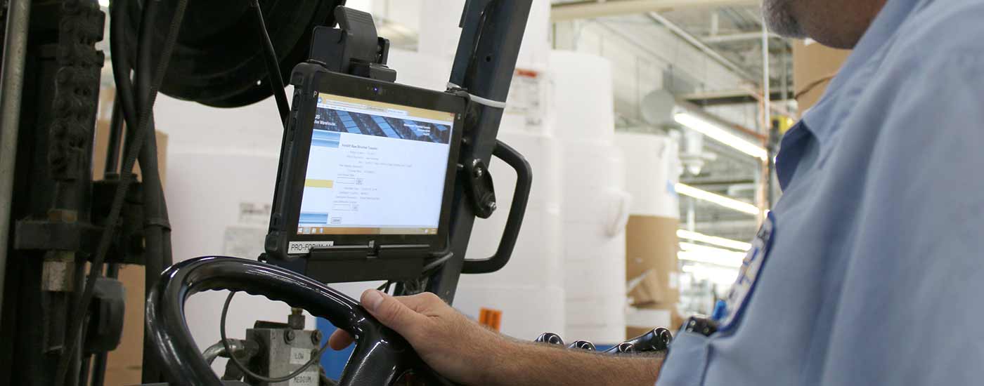 a rugged tablet mounted to a forklift