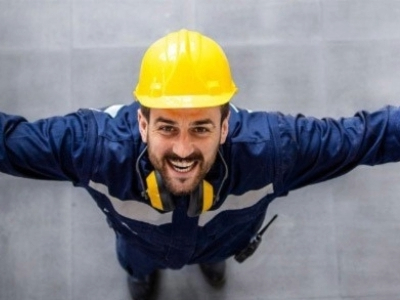 warehouse worker wearing yellow hardhat