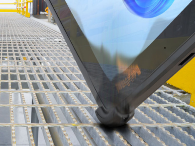 rugged tablet dropped on corner on shelving