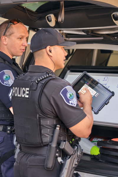 police officers holding rugged surface